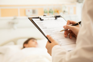 nurse monitoring the patient's condition